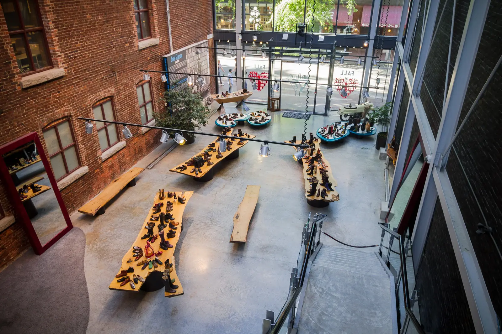 Custom slab display tables at the John Fluevog store in Gastown, Vancouver