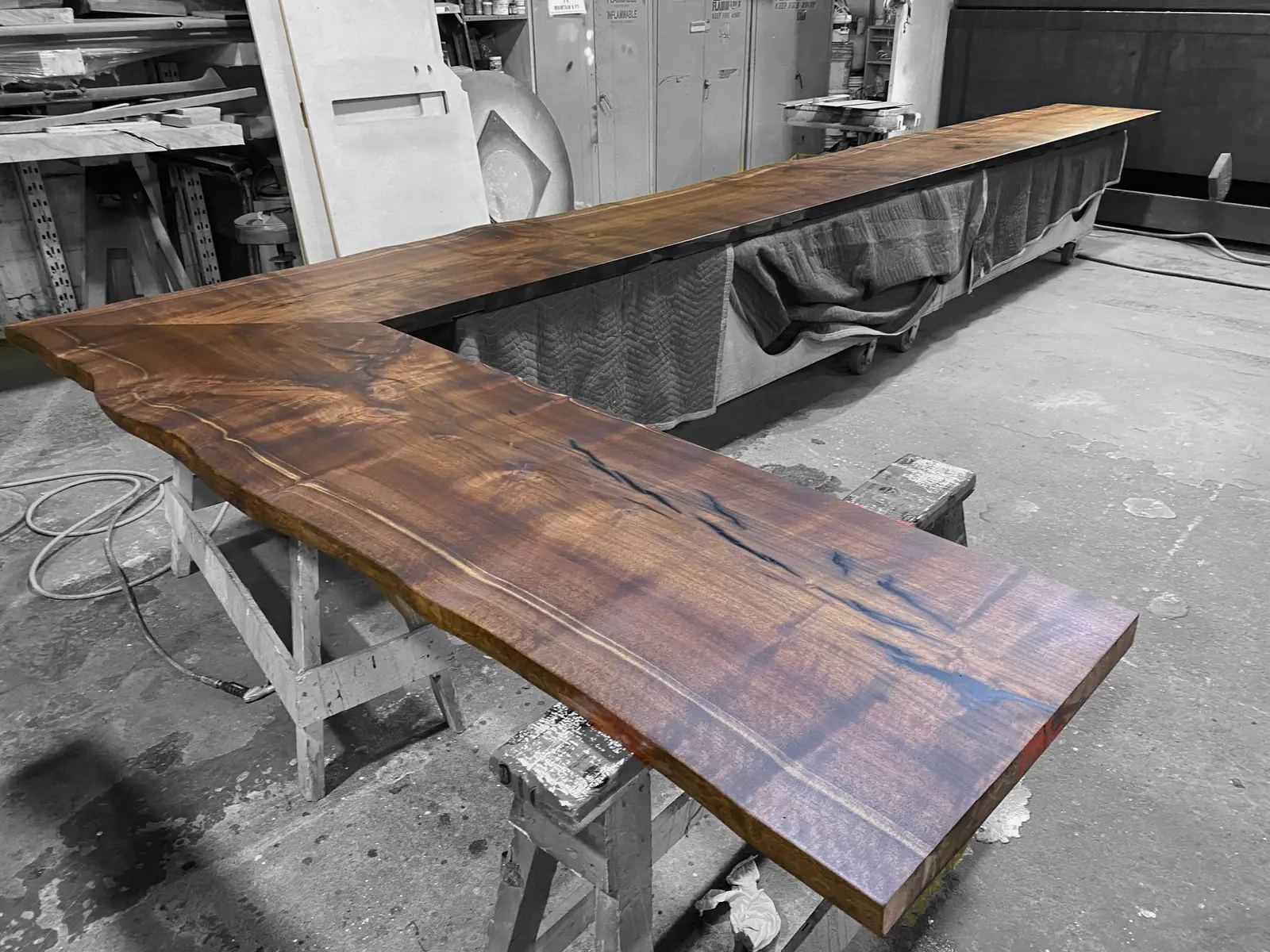Solid walnut bar top in production at the Chapel Arts shop